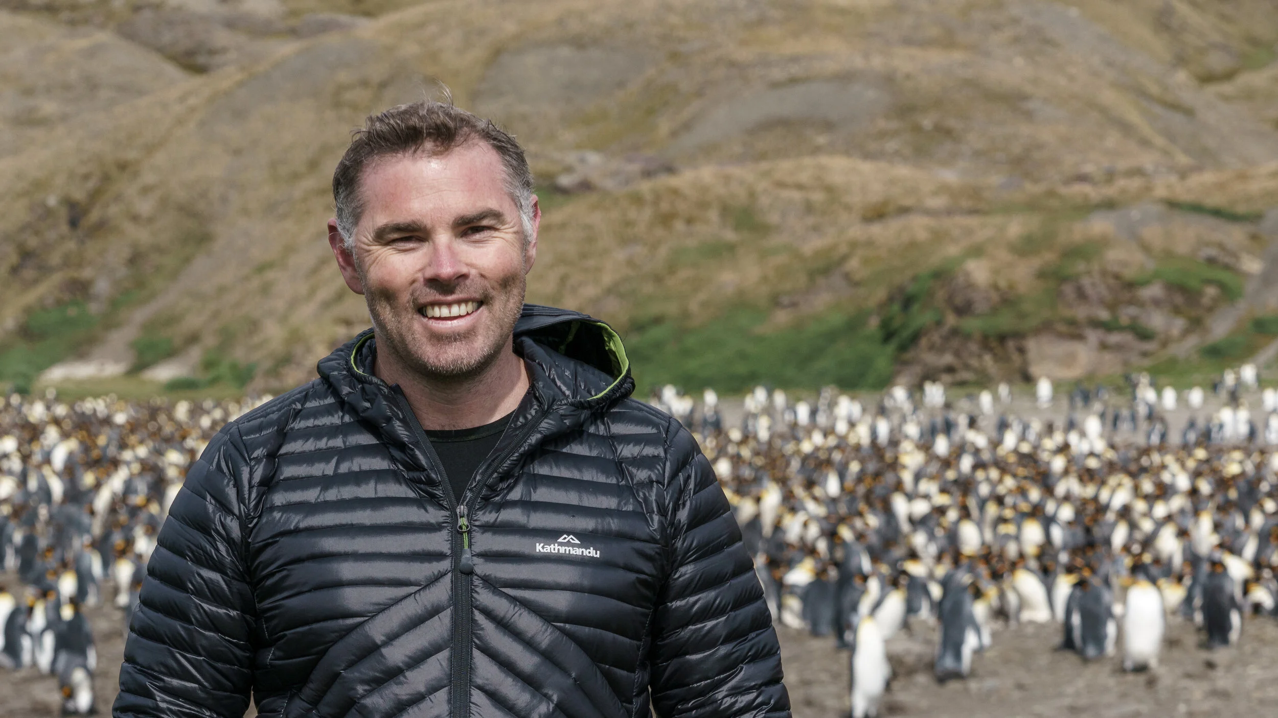 Simon Pierce with king penguins in South Georgia